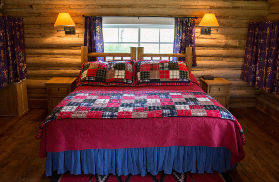 Queen bedroom in Hill Cabin 1 | Wyoming Guest Ranch | CM Ranch